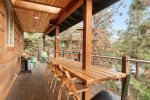 Enjoy outdoor community seating w beautiful views on expansive deck at the Fun House